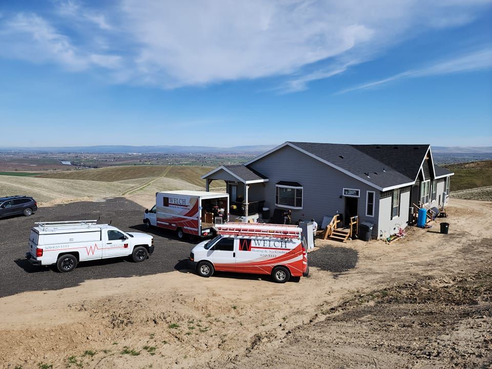 Welch vans at a new home install in the Tri-Cities